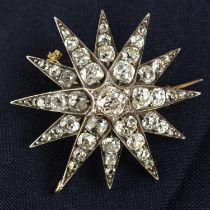A late Victorian silver and gold old-cut diamond starburst pendant/brooch.