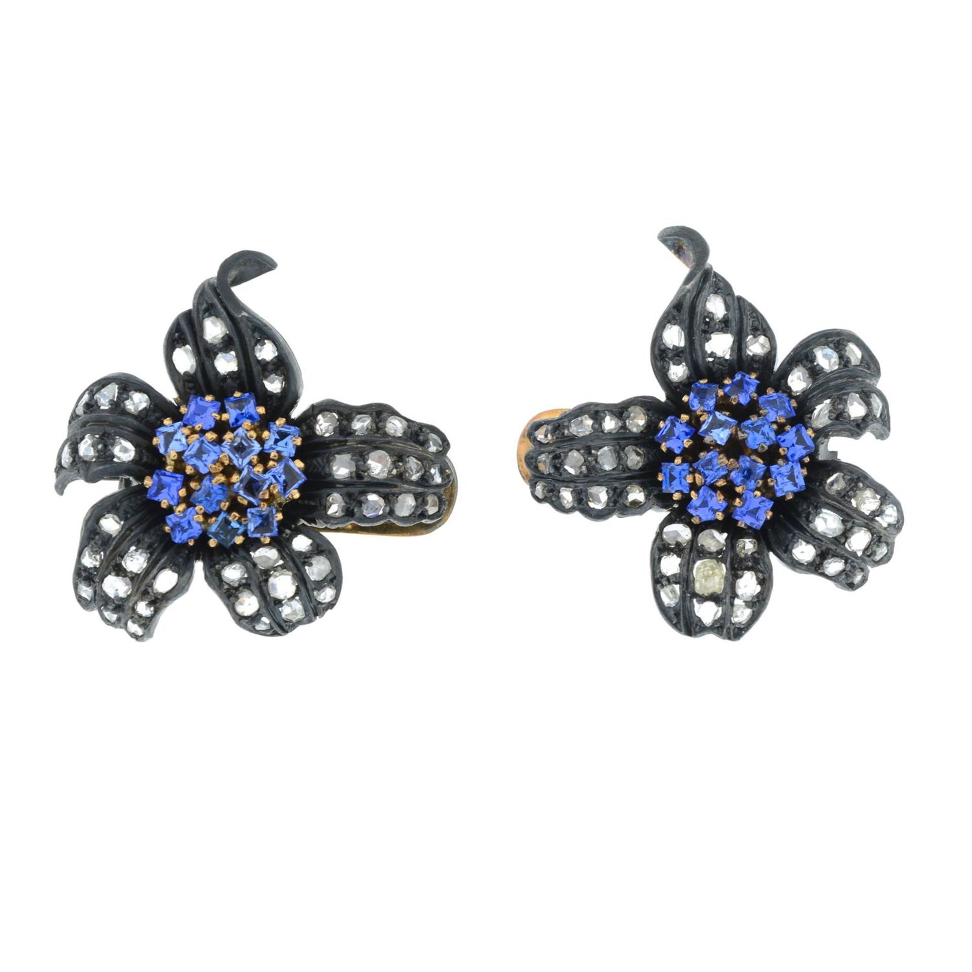 A pair of synthetic sapphire and rose-cut diamond floral earrings/brooches. - Image 2 of 3