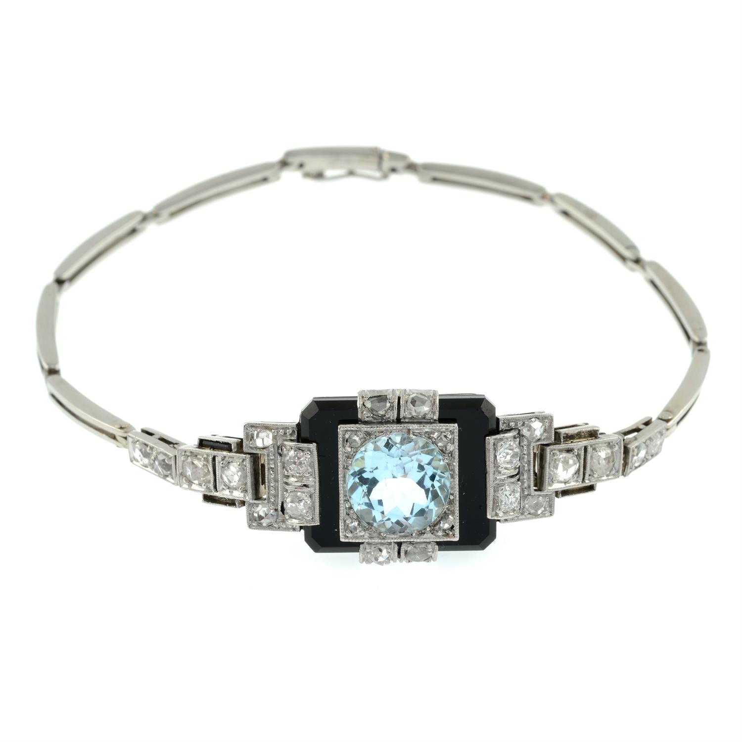 An Art Deco platinum and gold blue topaz, onyx and vari-cut diamond bracelet. - Image 2 of 4