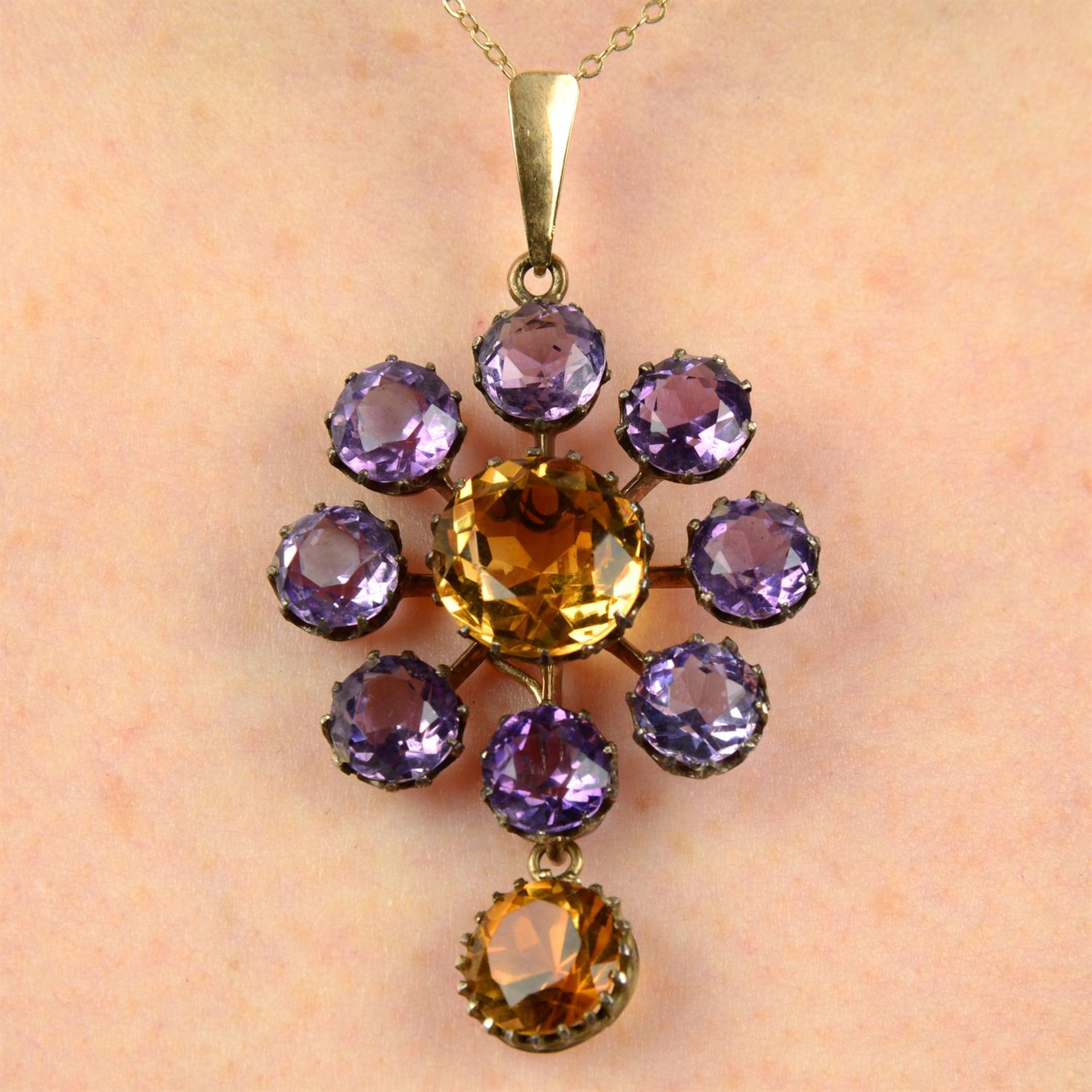 A late 19th century citrine and amethyst cluster pendant, with later surmount and trace-link chain.