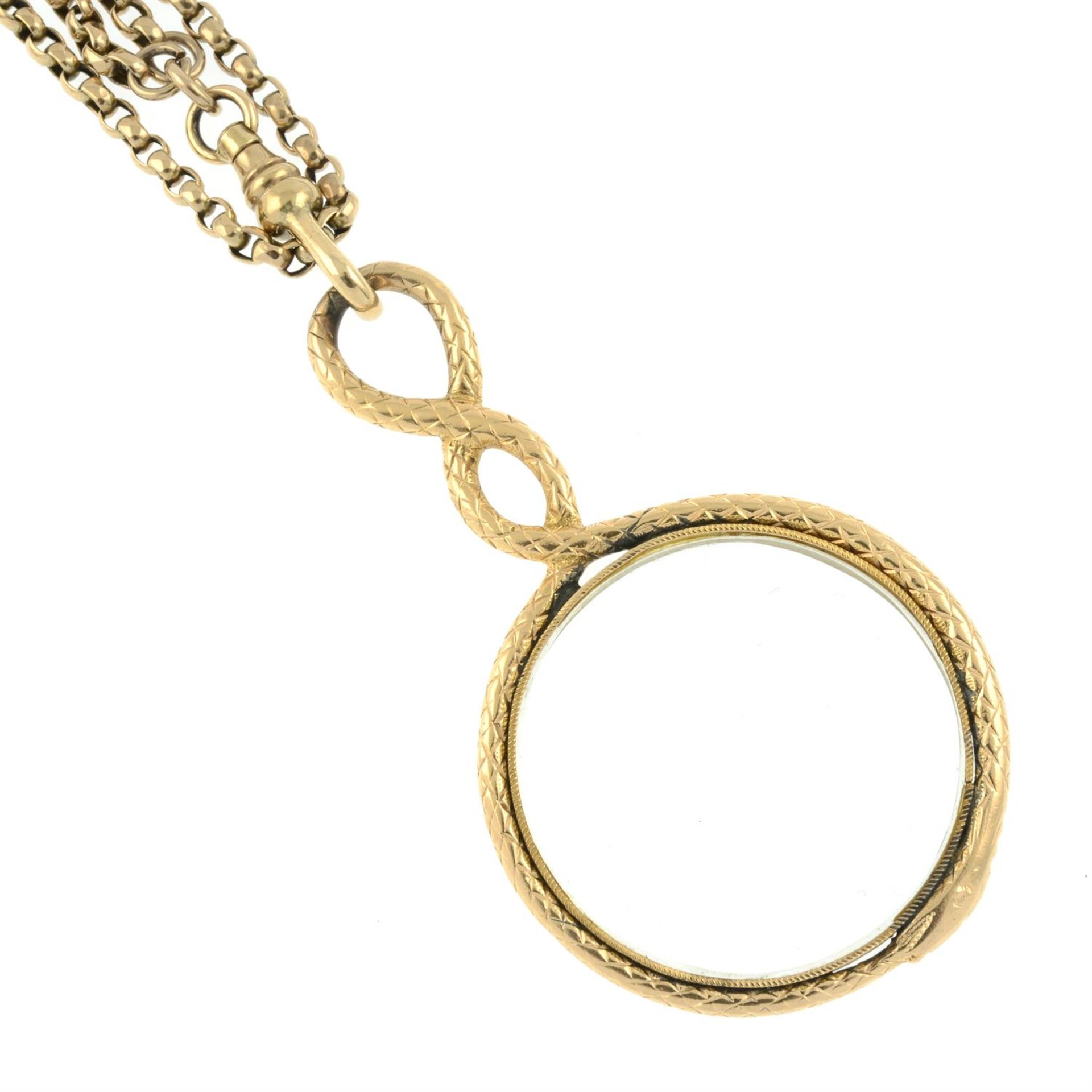 A late Georgian 15ct gold ouroboros snake magnifying glass, with late 19th century long guard chain. - Image 4 of 4