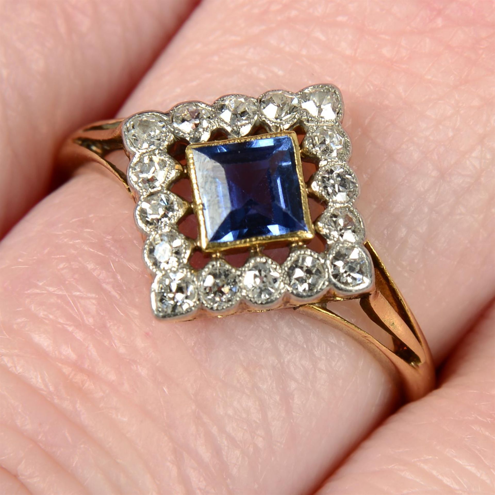 An Edwardian 18ct gold sapphire and old-cut diamond cluster ring.