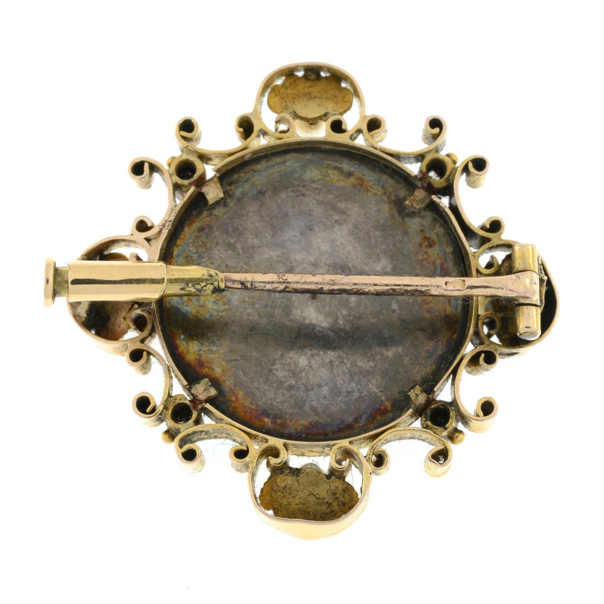 An early 20th century gold mounted enamel brooch depicting a woman, to a shell and scroll - Image 3 of 4