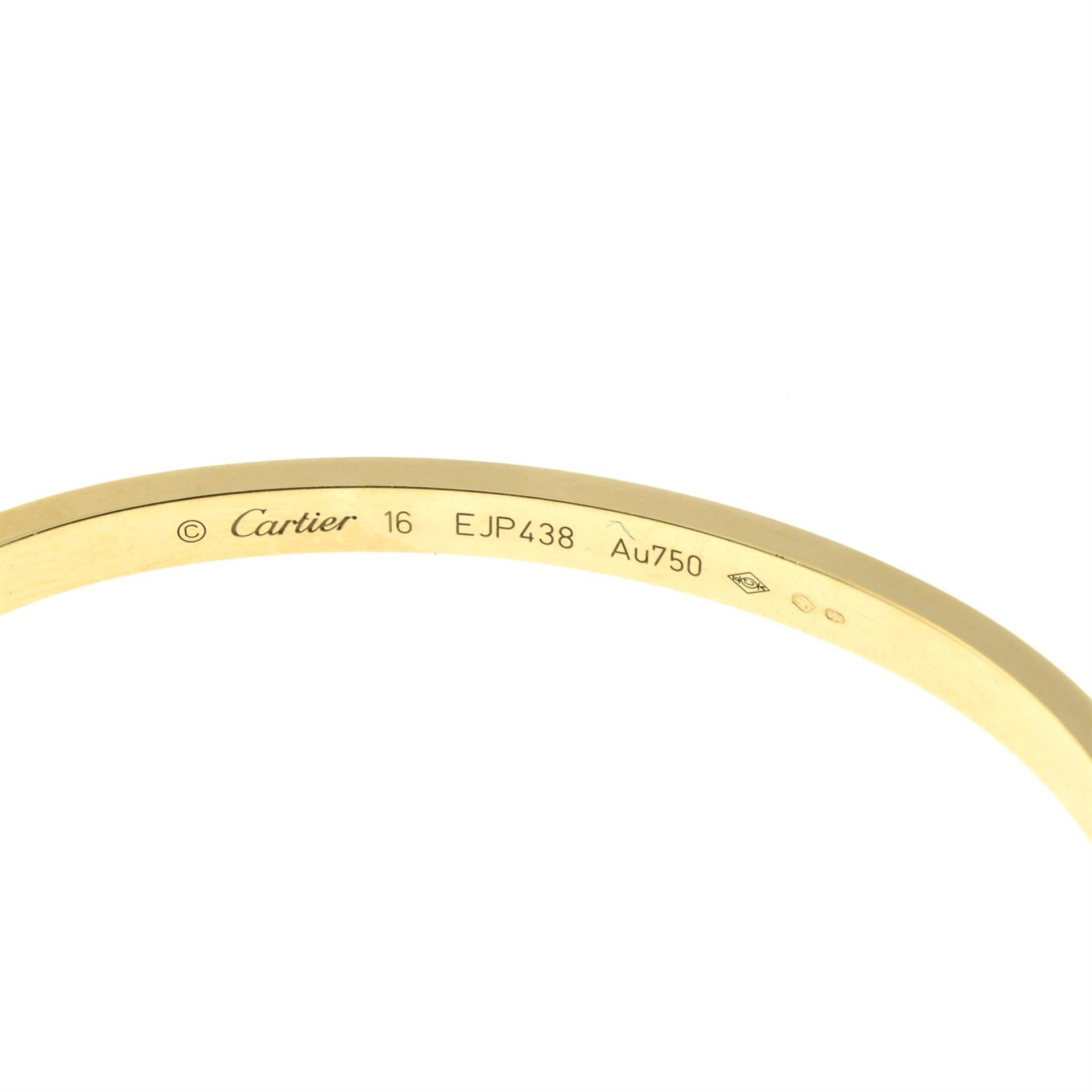 An 18ct gold 'Love' bangle, by Cartier. - Bild 4 aus 4