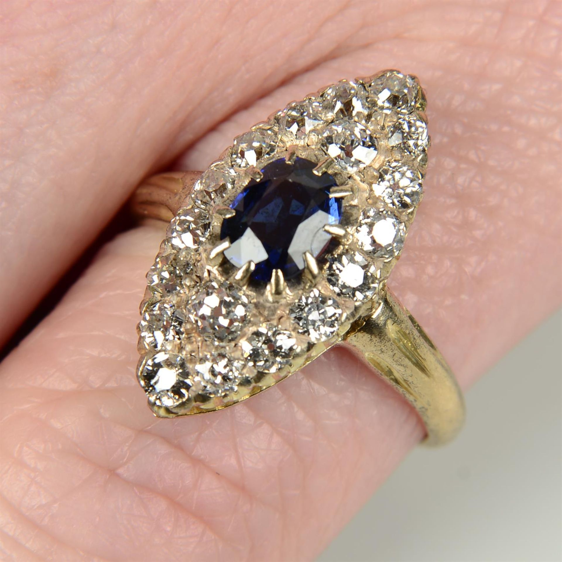 A late Victorian 15ct gold sapphire and old-cut diamond marquise-shape ring.