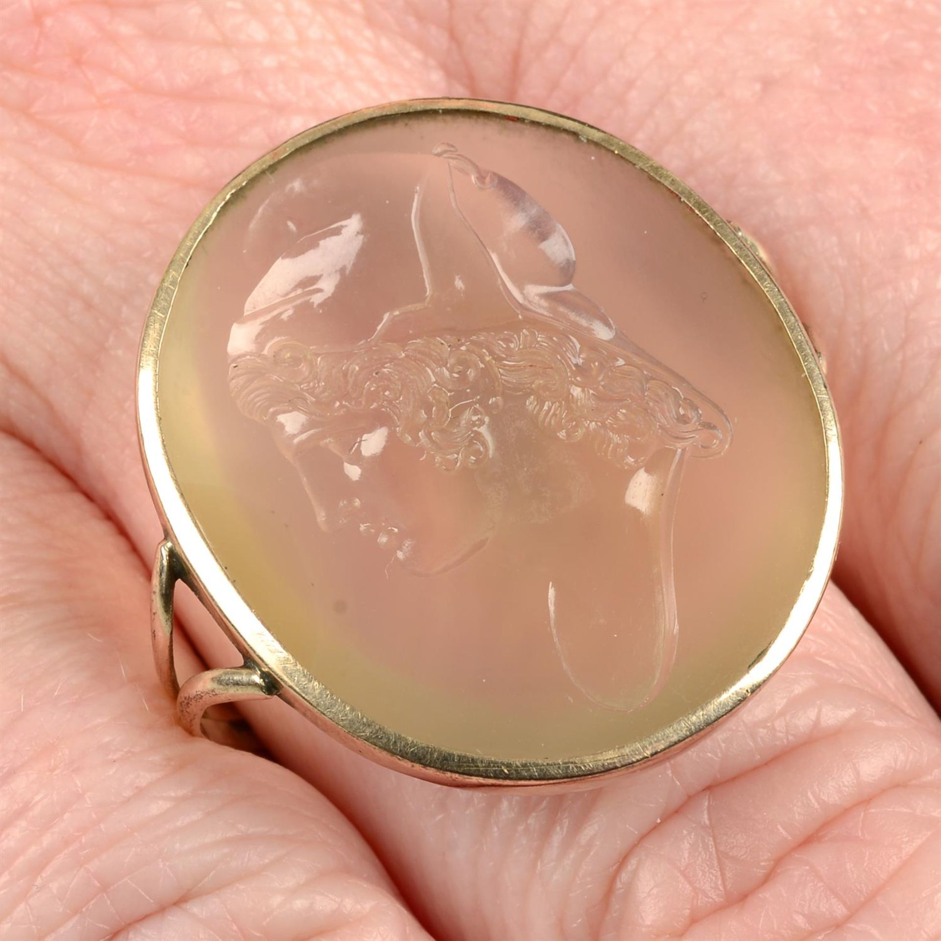 A 19th century chalcedony intaglio, carved to depict Ganymede, with later mount.