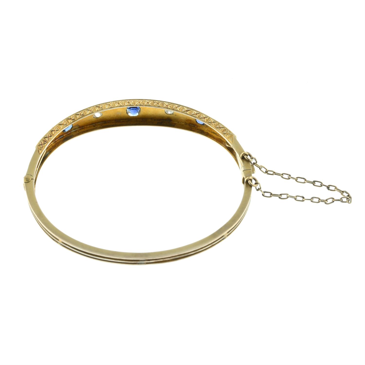 A late 19th century gold sapphire and old-cut diamond hinged bangle. - Image 3 of 3