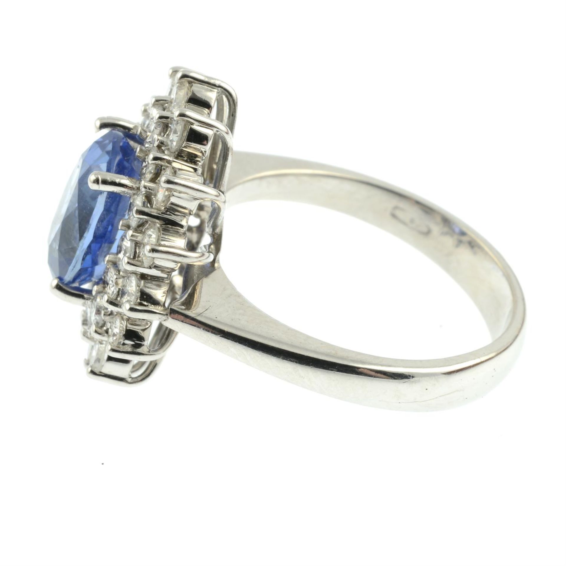 An 18ct gold brilliant-cut diamond and sapphire cluster ring. - Image 3 of 5