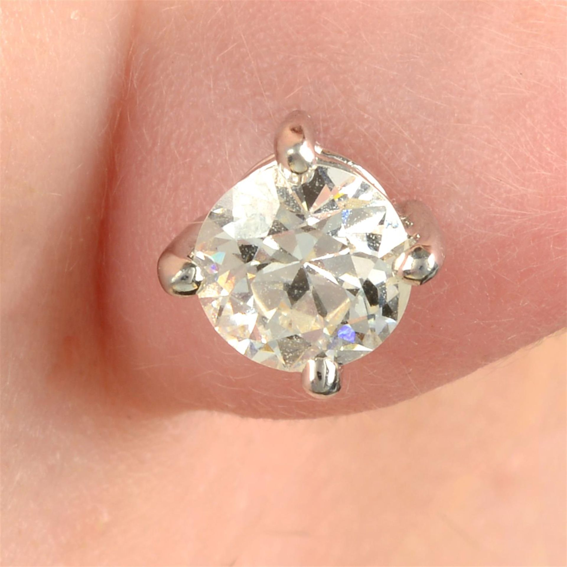 A pair of 18ct gold old-cut diamond stud earrings.