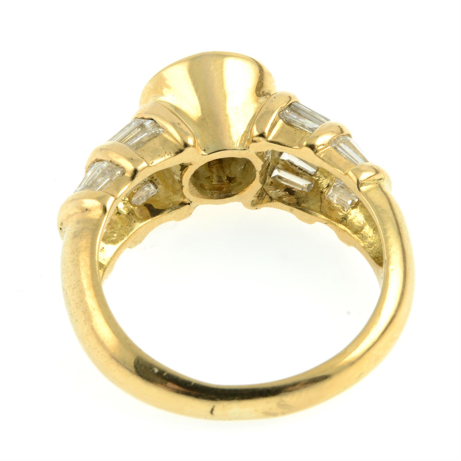 A brilliant-cut diamond dress ring, with baguette-cut diamond shoulders. - Image 4 of 6