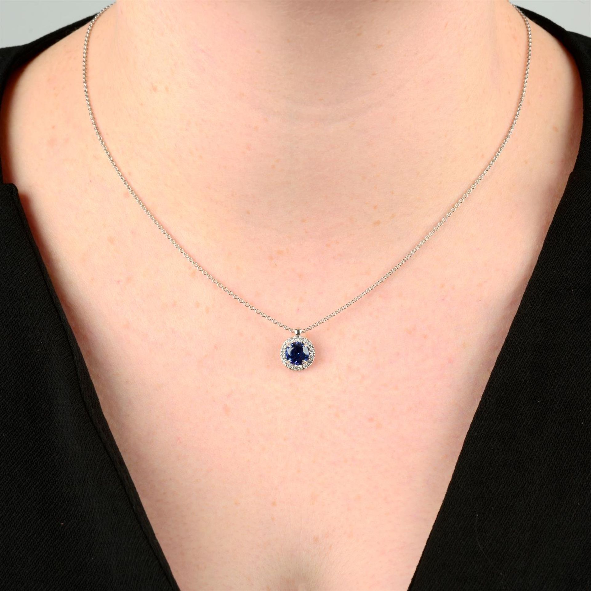 An 18ct gold tanzanite and brilliant-cut diamond 'Joy' pendant, on chain, by Bucherer. - Bild 5 aus 5