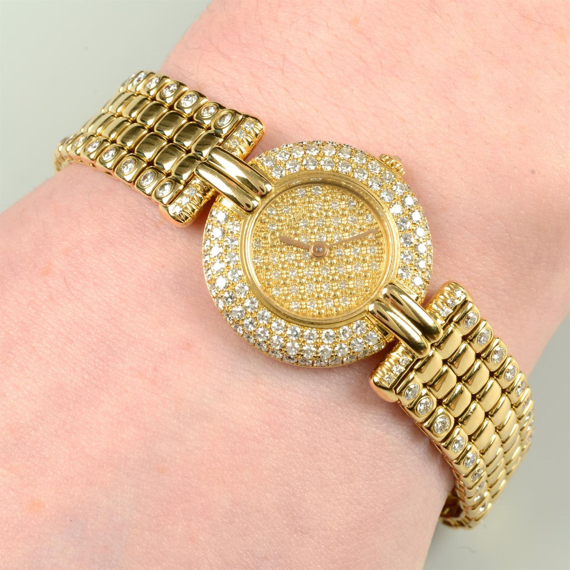 A lady's pavé-set diamond 'Colisee' wristwatch, by Cartier.