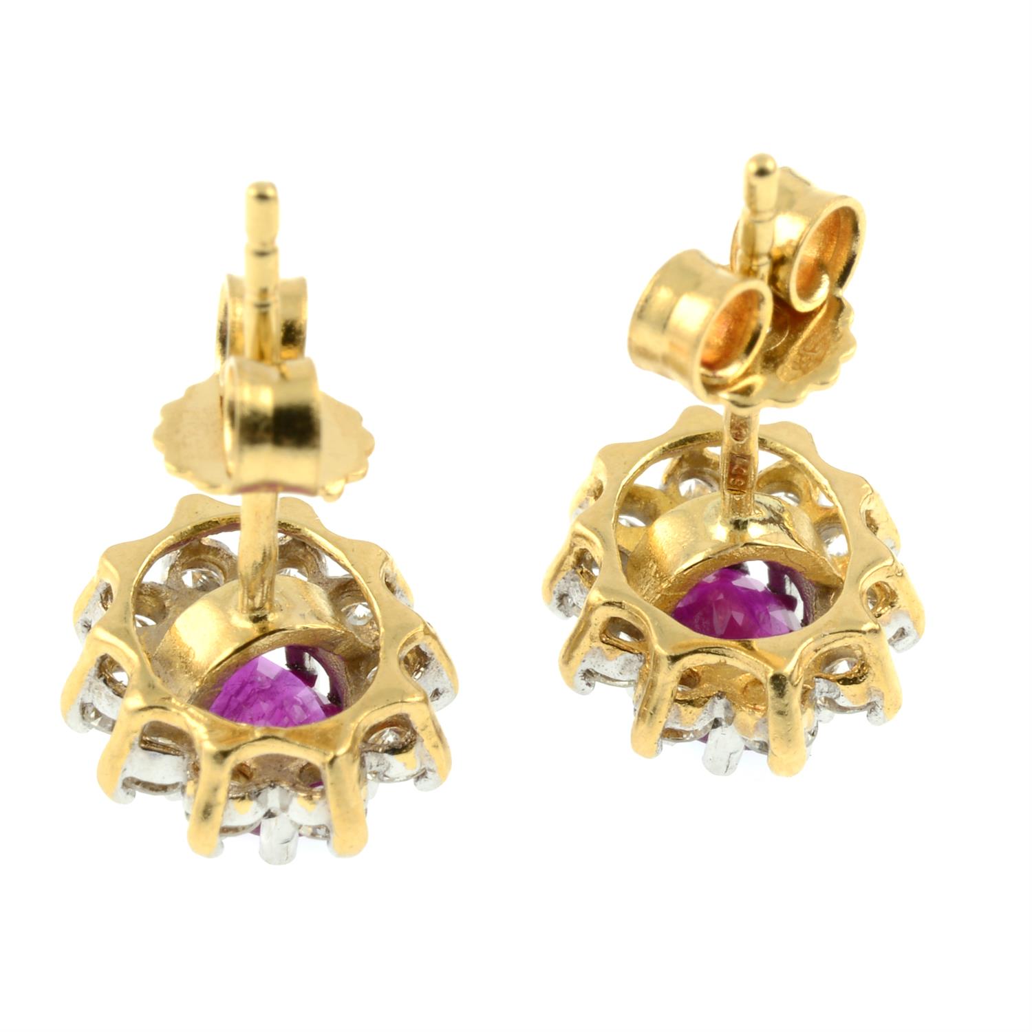 A pair of 18ct gold ruby and brilliant-cut diamond cluster earrings. - Image 3 of 3