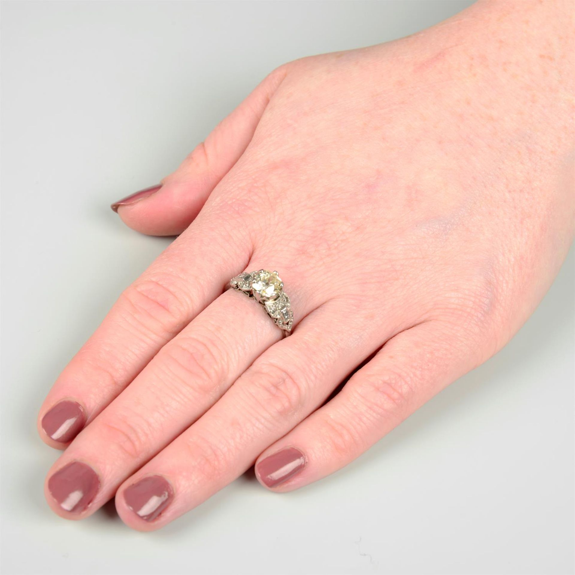 A mid 20th century platinum old-cut diamond single-stone ring, with vari-cut diamond shoulders. - Image 5 of 5
