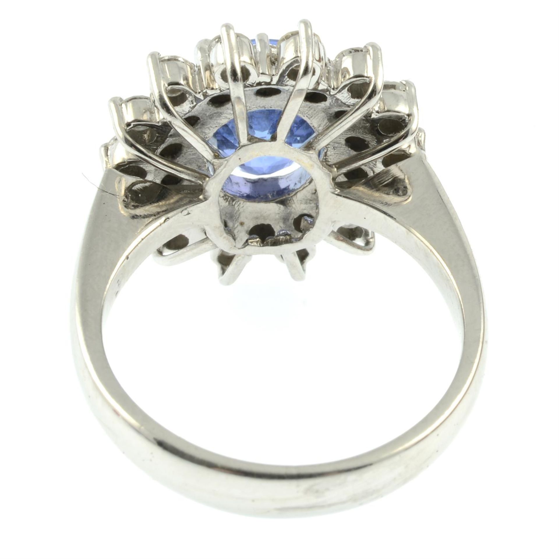 An 18ct gold brilliant-cut diamond and sapphire cluster ring. - Image 4 of 5