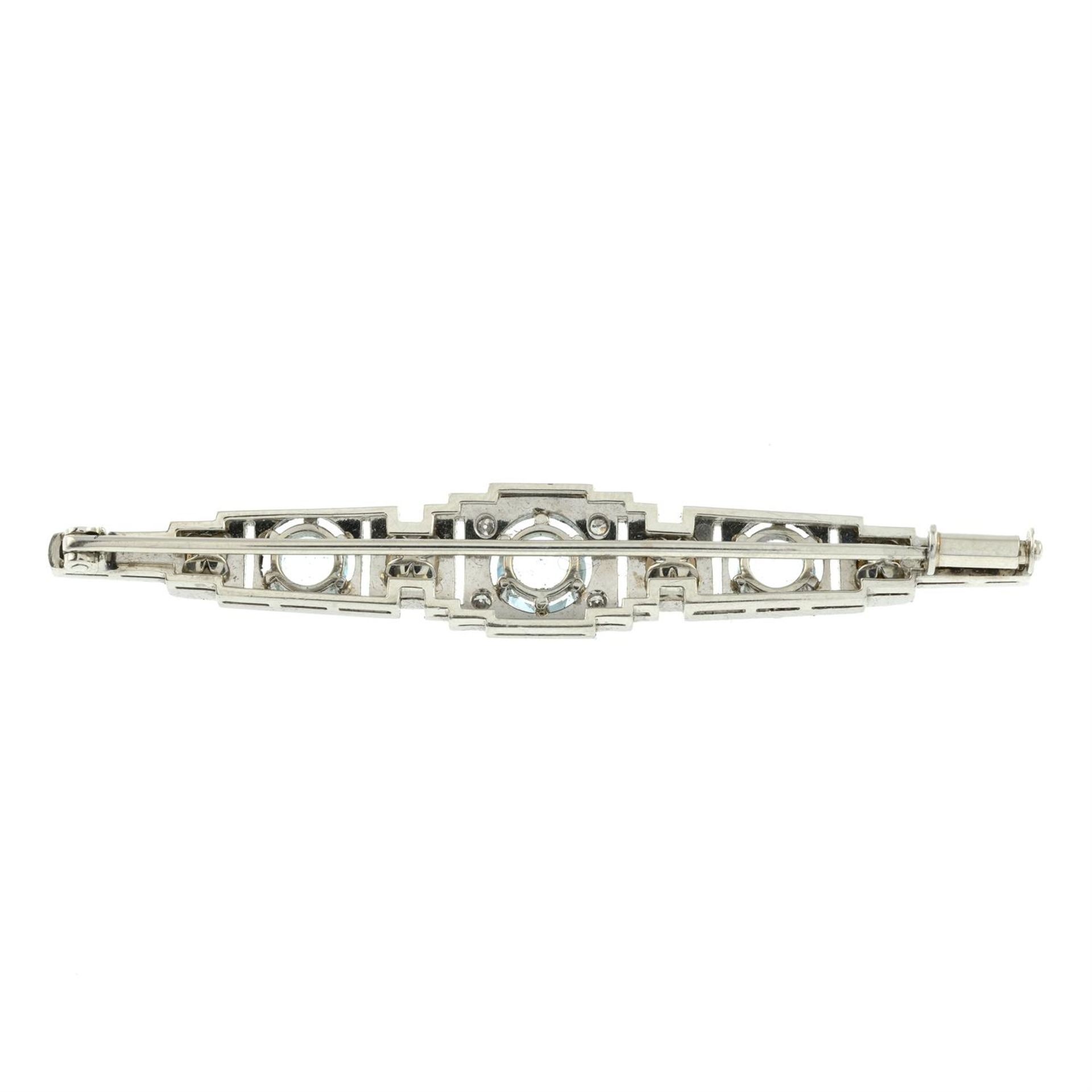 A mid 20th century palladium and gold, blue topaz, cultured pearl and diamond geometric bar brooch. - Image 3 of 4