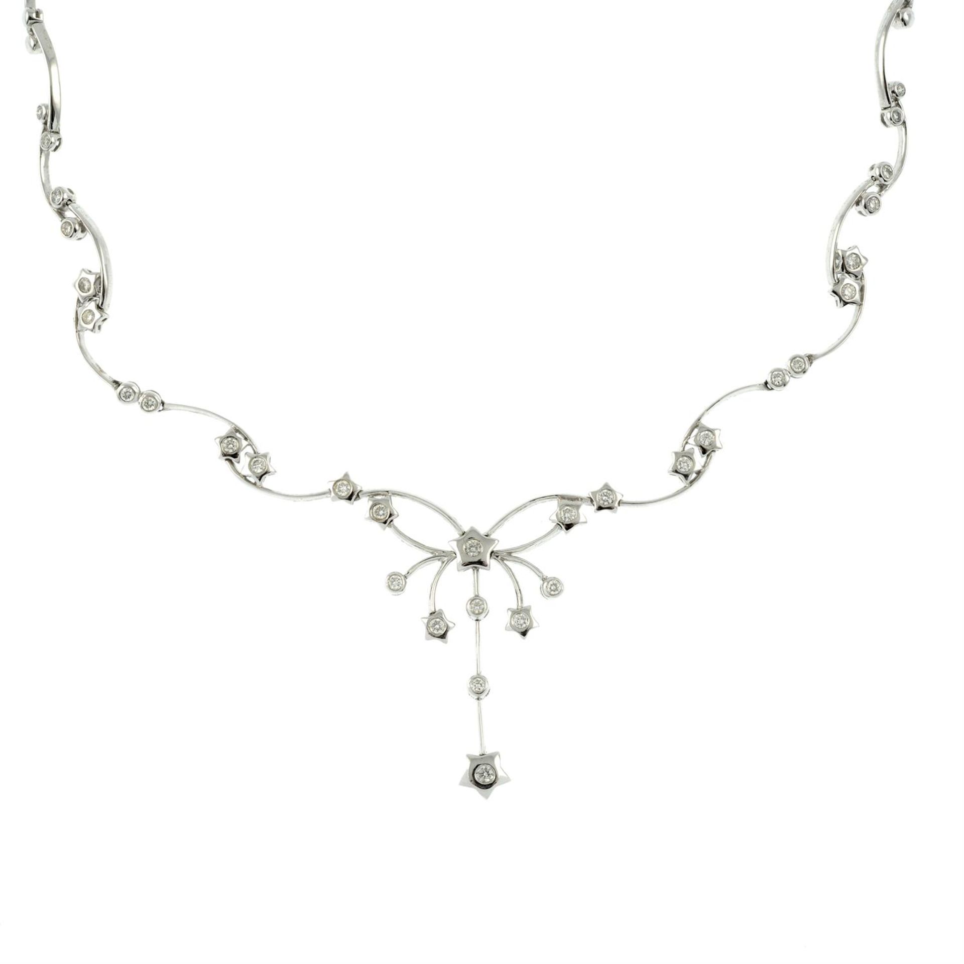 A brilliant-cut diamond star motif necklace. - Image 2 of 4