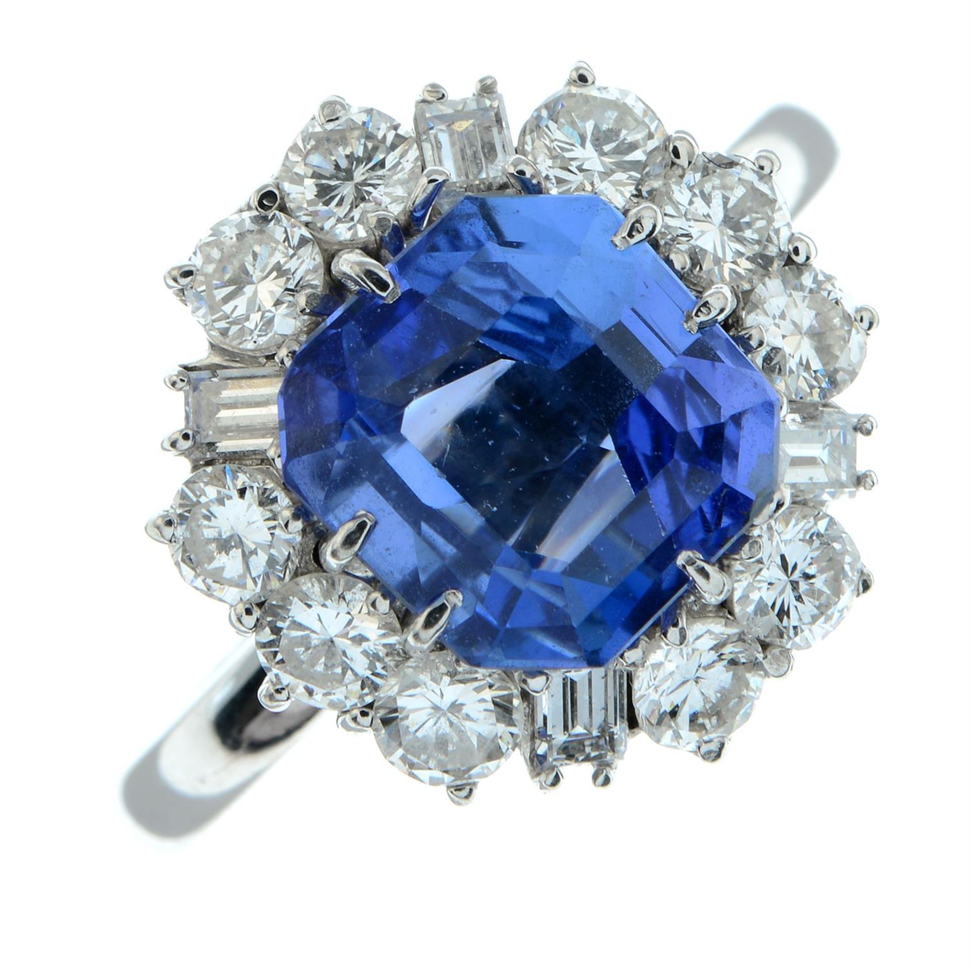 A Madagascan sapphire ring, with brilliant and baguette-cut diamond surround. - Image 2 of 5