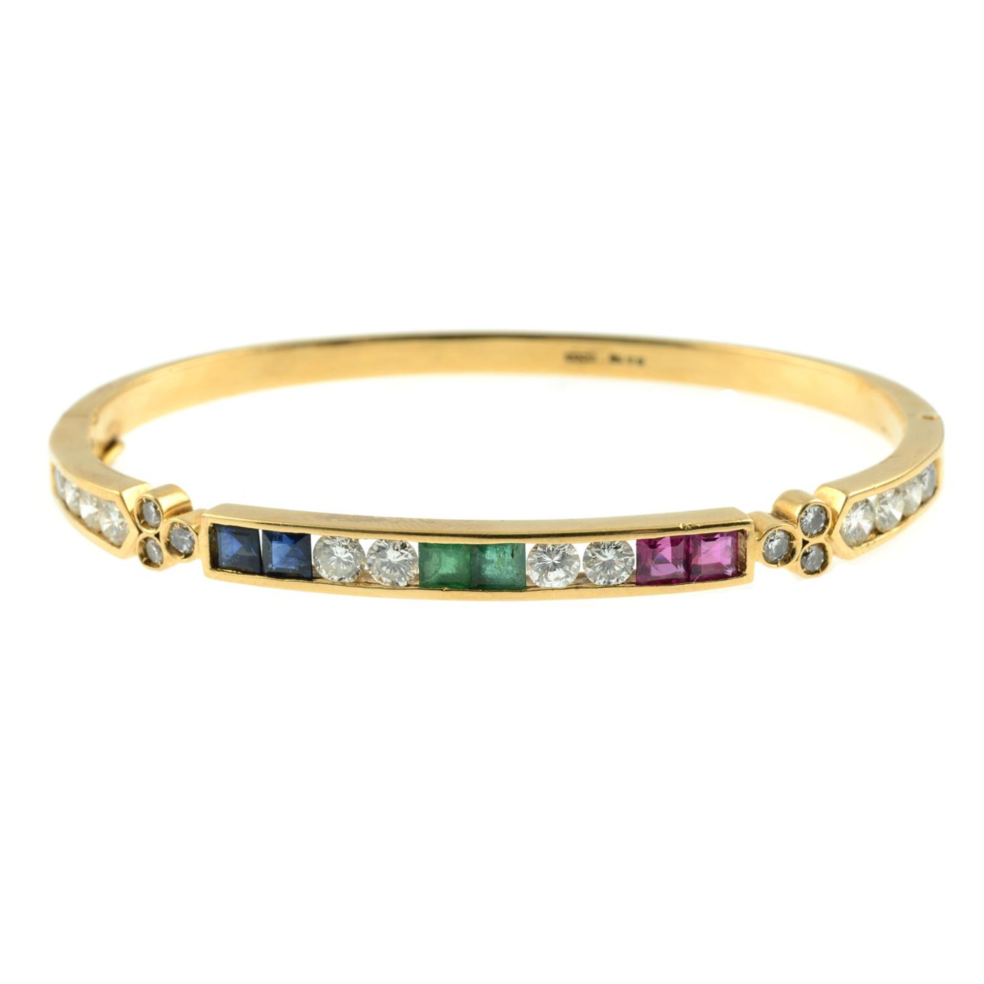 An 18ct gold brilliant-cut diamond, sapphire, emerald and ruby hinged bangle. - Image 2 of 3