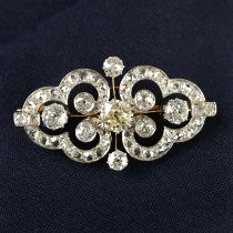 An early 20th century platinum and gold old and rose-cut diamond brooch.