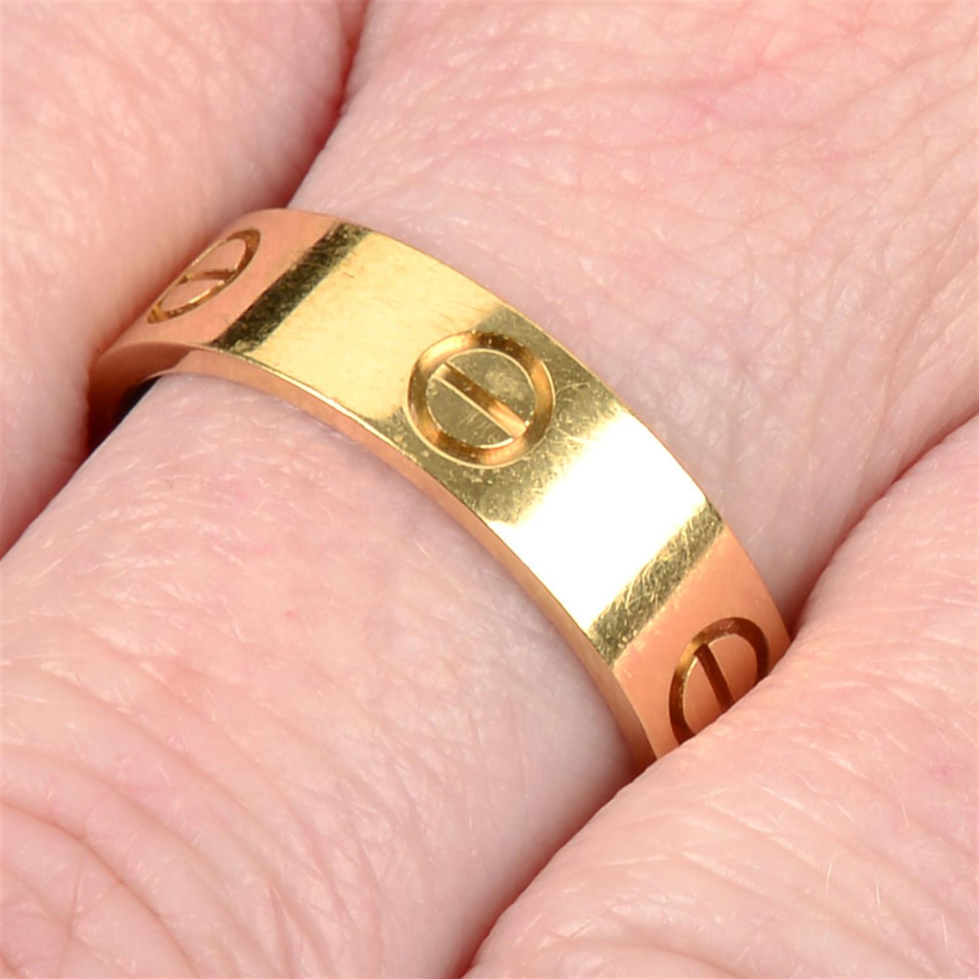 An 18ct gold 'Love' ring, by Cartier.