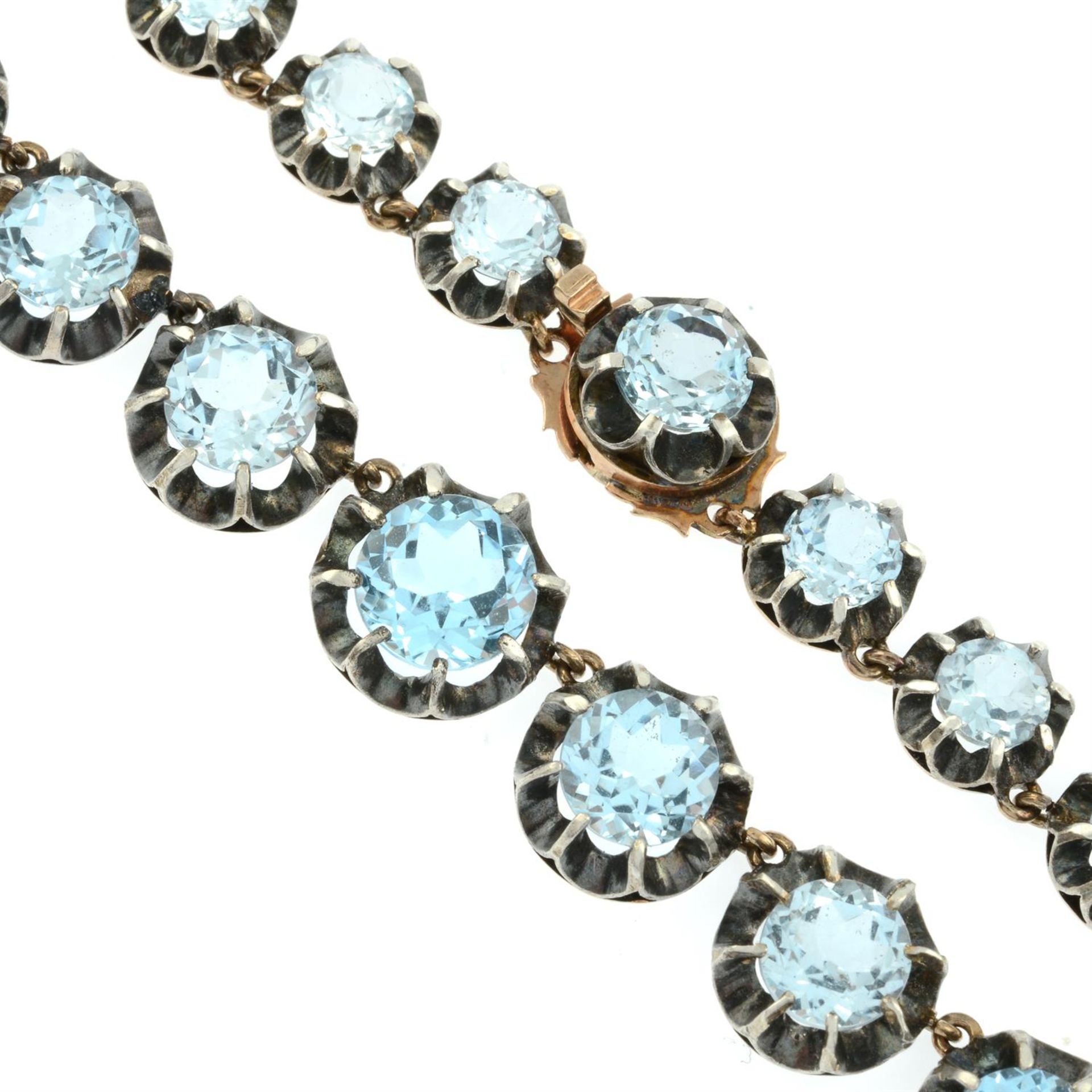 A 19th century silver and gold blue topaz rivière necklace. - Image 4 of 4