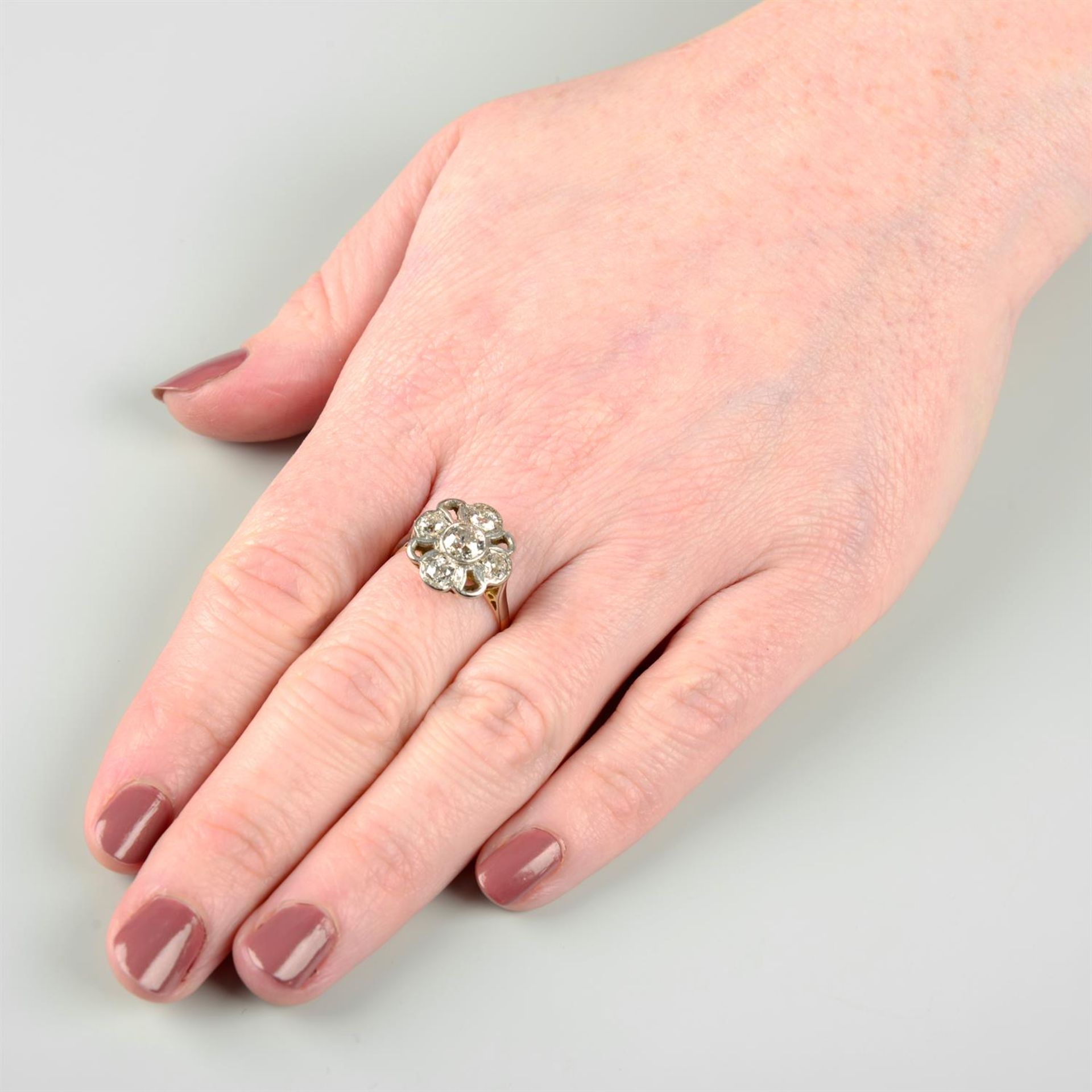 An early to mid 20th century platinum and 18ct gold old-cut diamond floral dress ring. - Image 5 of 5