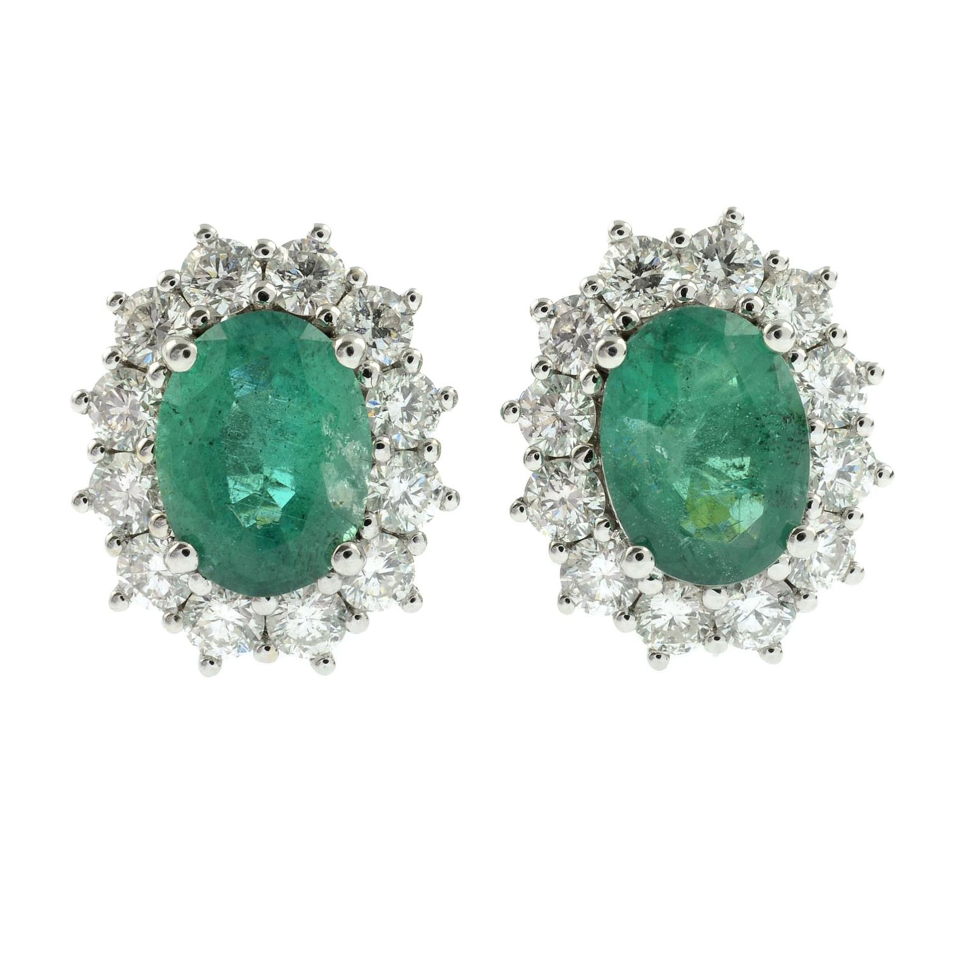 A pair of 18ct gold emerald and brilliant-cut diamond cluster earrings. - Image 2 of 3