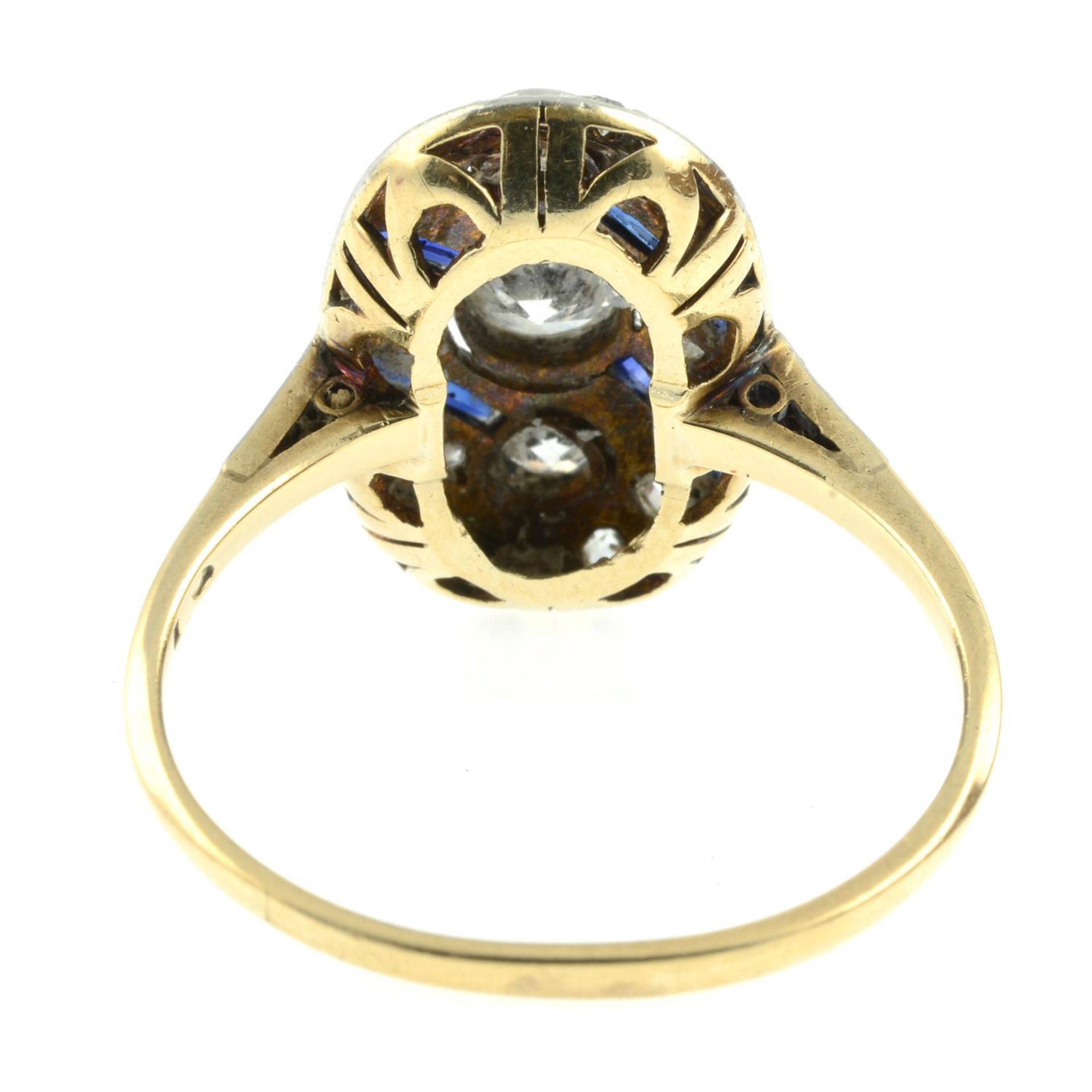 An Art Deco platinum and 14ct gold vari-cut diamond and sapphire geometric ring. - Image 4 of 5