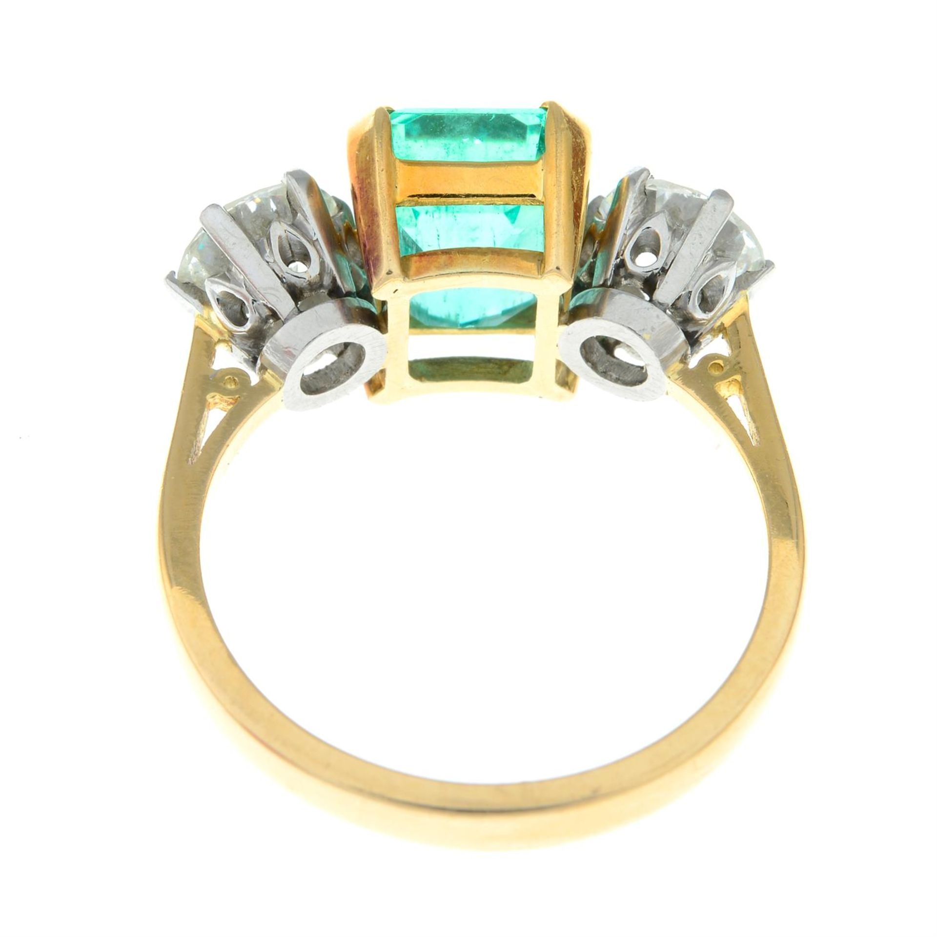 An 18ct gold emerald and brilliant-cut diamond three-stone ring. - Image 3 of 6