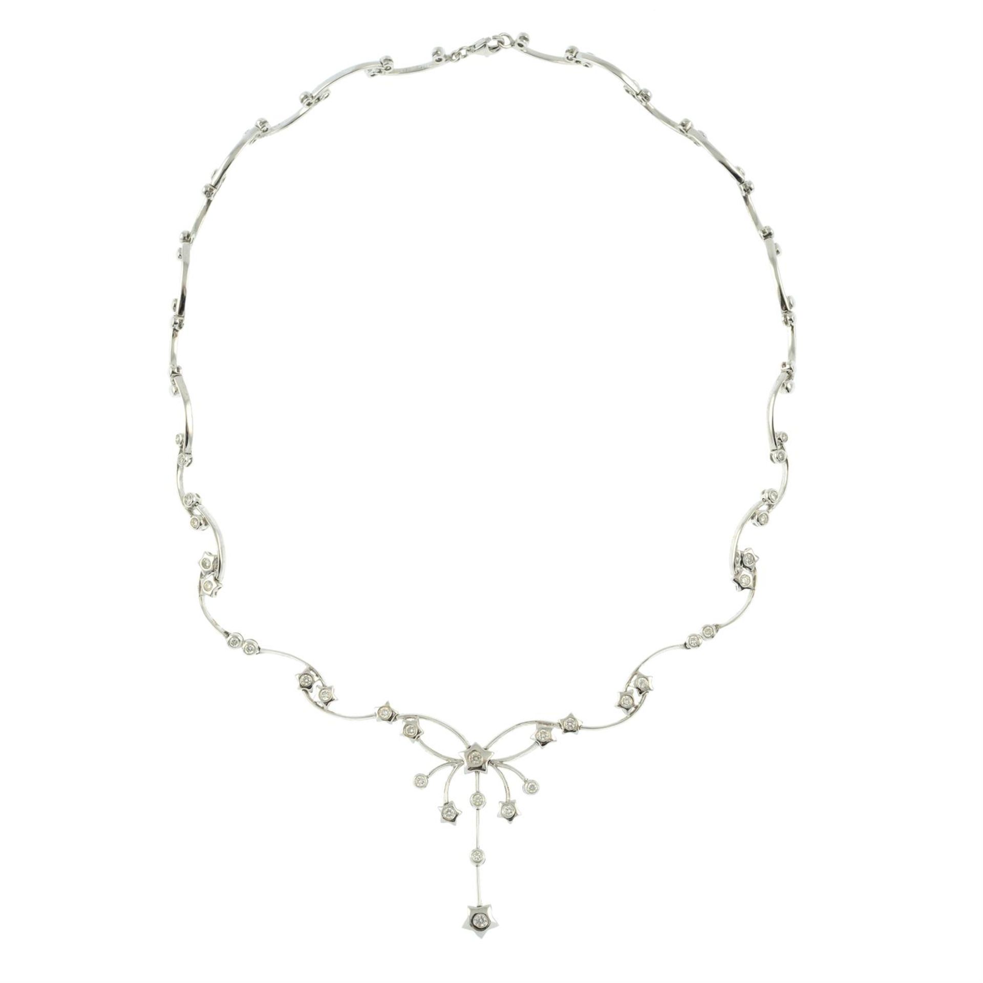 A brilliant-cut diamond star motif necklace. - Image 3 of 4