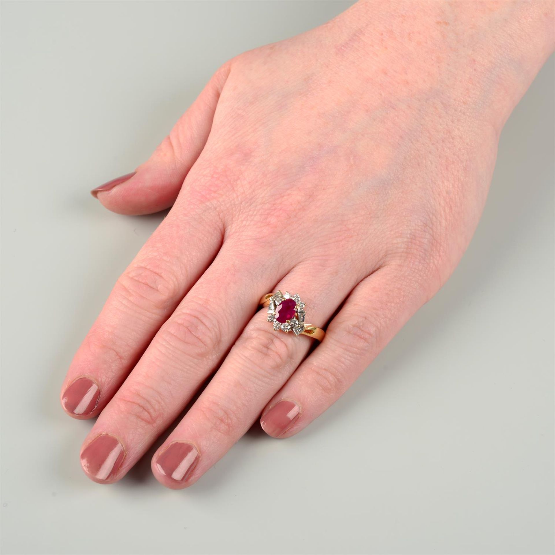 A ruby and vari-cut diamond cluster ring. - Image 5 of 5