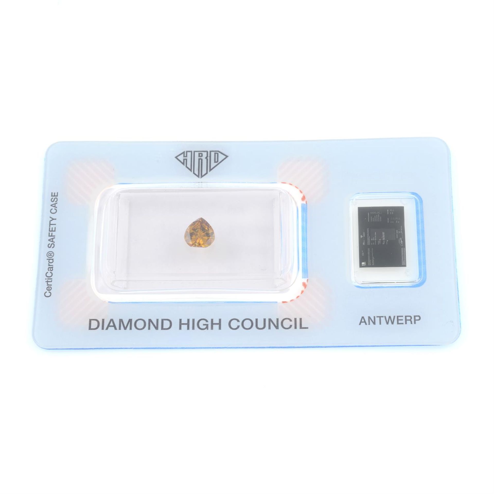 A Fancy Intense Yellowish Orange pear-cut diamond, weight 0.51cts. In HRD seal.