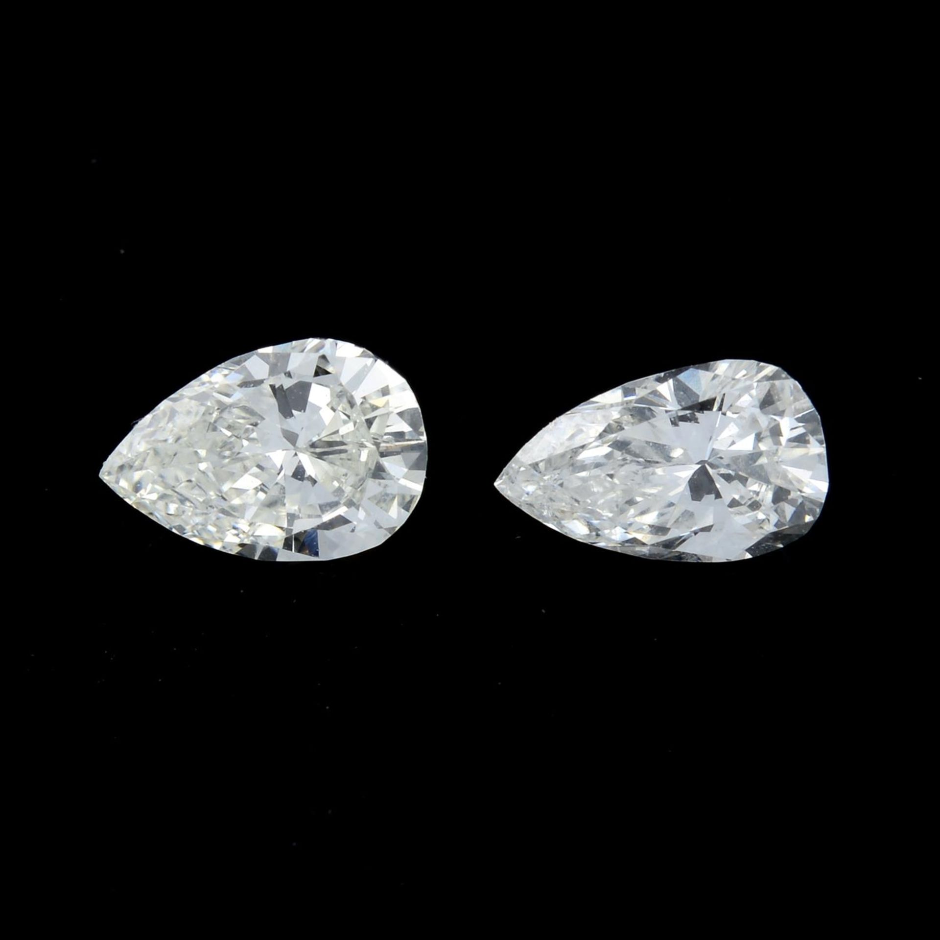 Two pear-shape diamonds, weight approximately 0.32ct and 0.33ct.