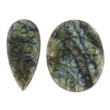 A pair of vari-shape carved labradorite, total weight 405.84cts. Designed as flowers and foliage.