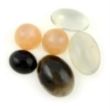 A selection of vari-coloured cat's-eye moonstones, total weight 54.47cts.