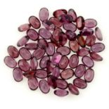 A selection of oval-shape purple garnets, total weight 33.71cts.