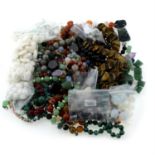 A selection of strung and unstrung beads, total weight approximately 2.35kgs. To include amethyst,