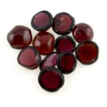 A selection of vari-shape tumbled garnets, total weight 32.39cts.