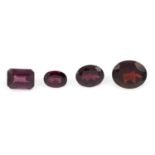 Four oval and rectangular-shape red garnets, total weight 12.75cts.