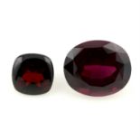 An oval-shape red garnet, together with a fancy-shape red garnet, weight 8.87cts and 2.51cts.