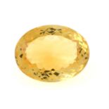 An oval-shape citrine, weight 26.58cts.