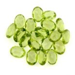A selection of oval-shape peridots, total weight 14.77cts.
