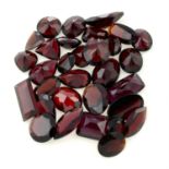 A selection of dark red vari-shape garnets, weight 123.76cts.