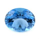 An oval-shape blue topaz, total weight 50.65cts.