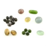 A selection of cat's-eyes cabochons, to include tourmaline, quartz and diopside, total weight 66.
