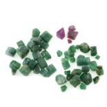 A selection of rough emerald and ruby crystals, total weight 175.21cts.