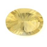 An oval-shape citrine, weight 60.65cts.