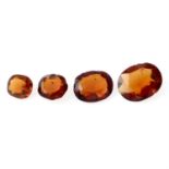 Four oval-shape garnets, total weight 6.86cts.