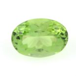 An oval-shape peridot, weight 5.01cts.